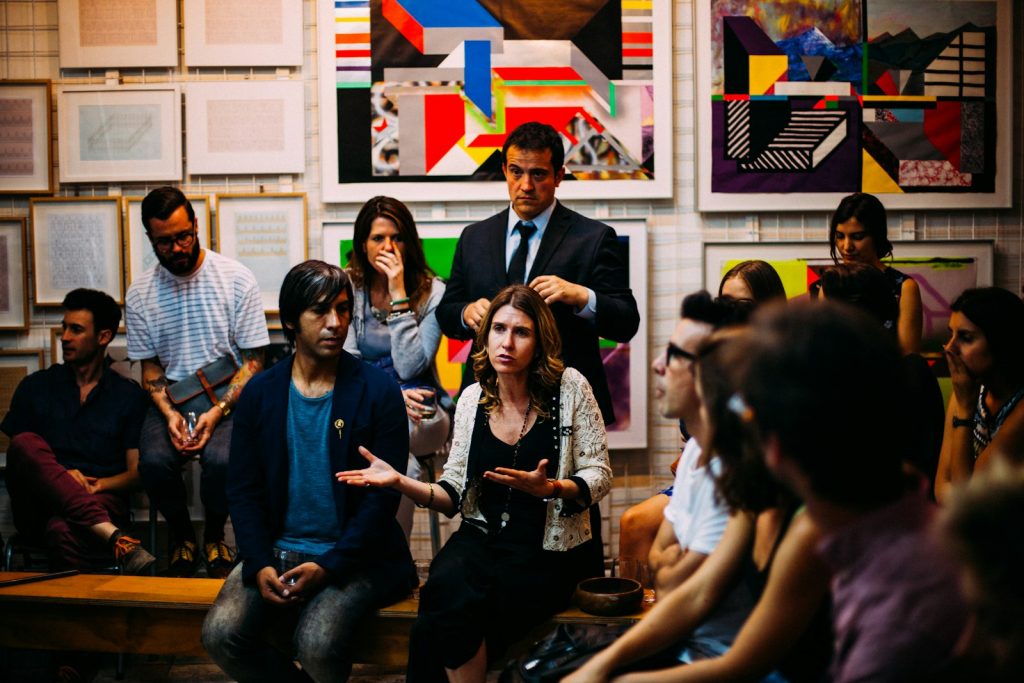 Audience members listening and asking questions during a career panel discussion